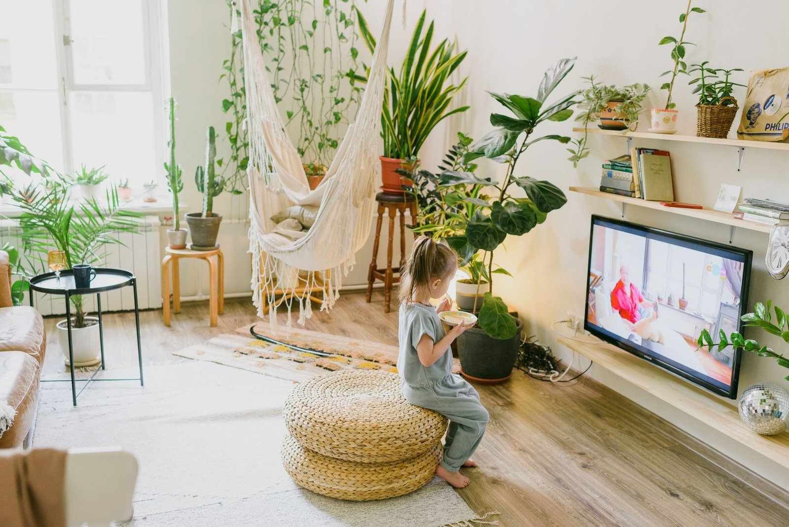 Tidy living room with a wall-mounted television and neat cabling